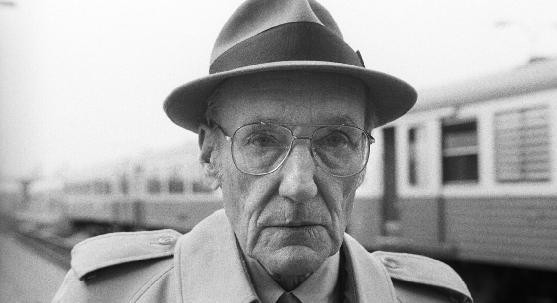 American writer William S. Burroughs poses during a portrait session at Bourges Railway Station on April 24, 1984 in Bourges, France.