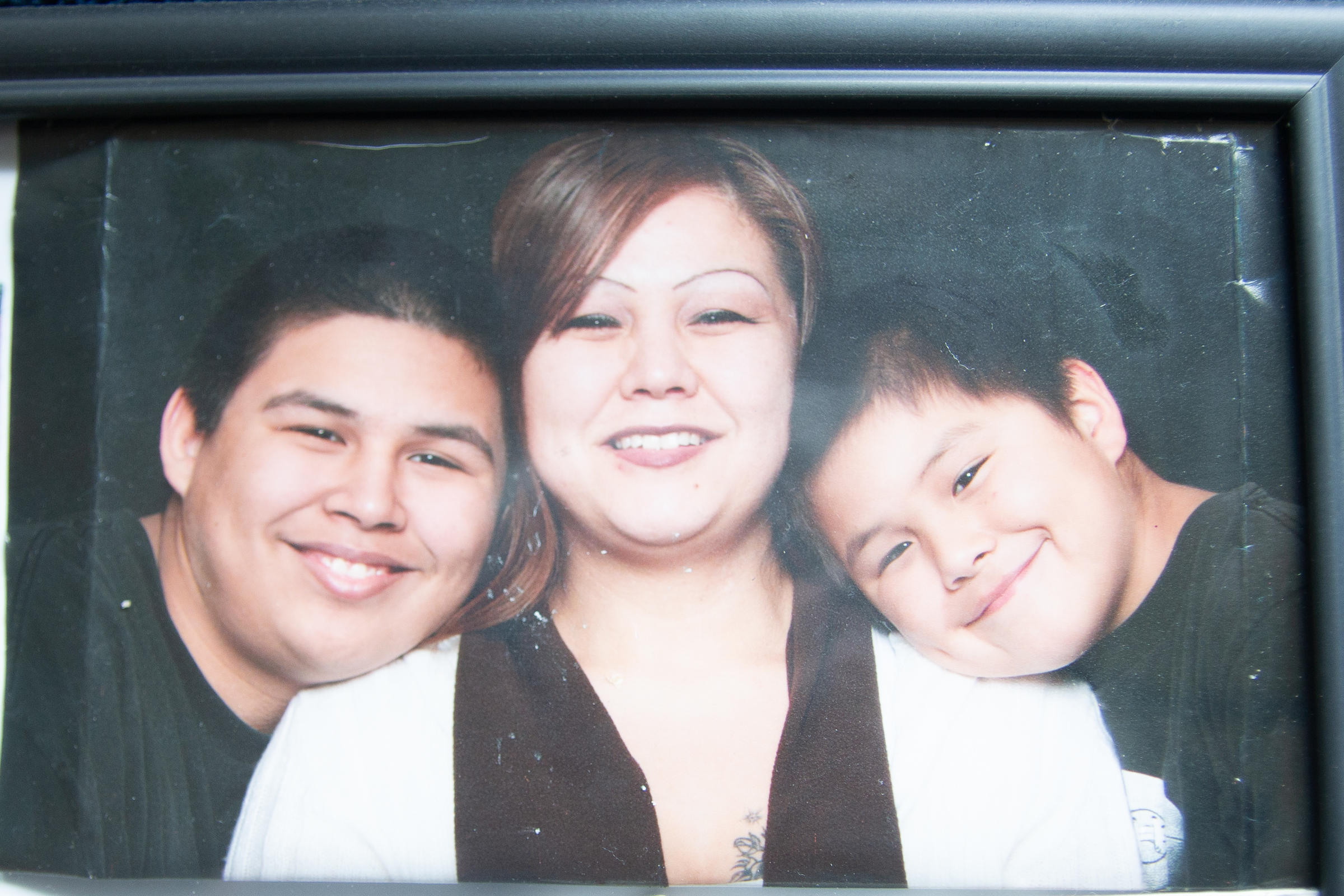 In this photo, Shannon Jefferson poses with two of her six children. CREDIT: SARAH WALLACE