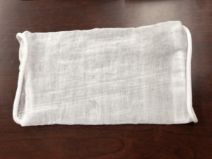 A sleeve made from biopolymer for clothing. The Mango team is working with several companies to test how well their biopolymer will work in textiles. CREDIT: CHRIS JOYCE/NPR