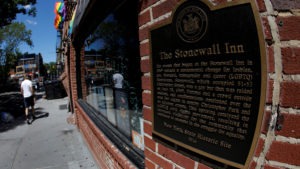 A man walks past New York's Stonewall Inn, site of the 1969 uprising considered the birth of the LGBTQ movement. CREDIT: Mike Segar/Reuters