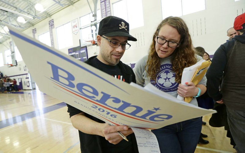 Organizers for Bernie Sanders' 2020 campaign have updated their efforts in Washington, one of a growing number of states switching from caucuses to primary elections for selecting presidential candidates. CREDIT: TED S. WARREN/AP