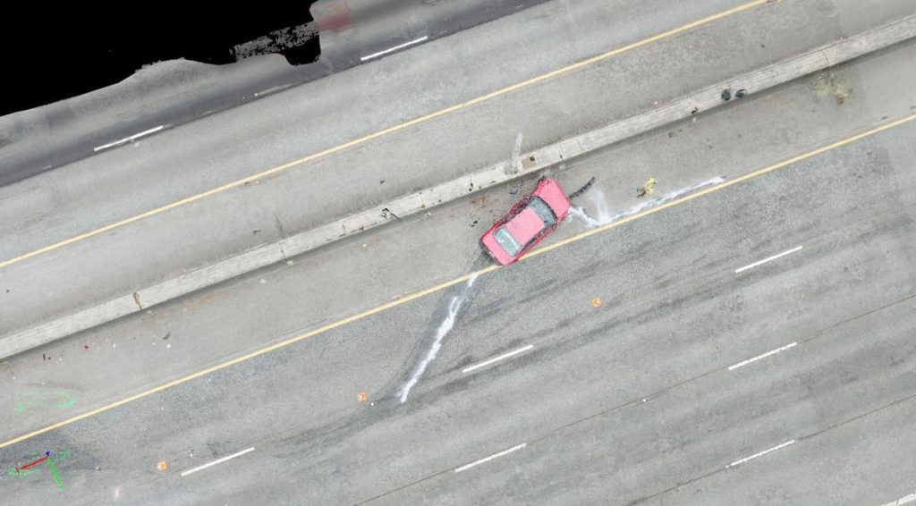 Screen shot from a 3-D crash scene model made by combining multiple still photos taken by one of the state patrol's drones. CREDIT: WSP