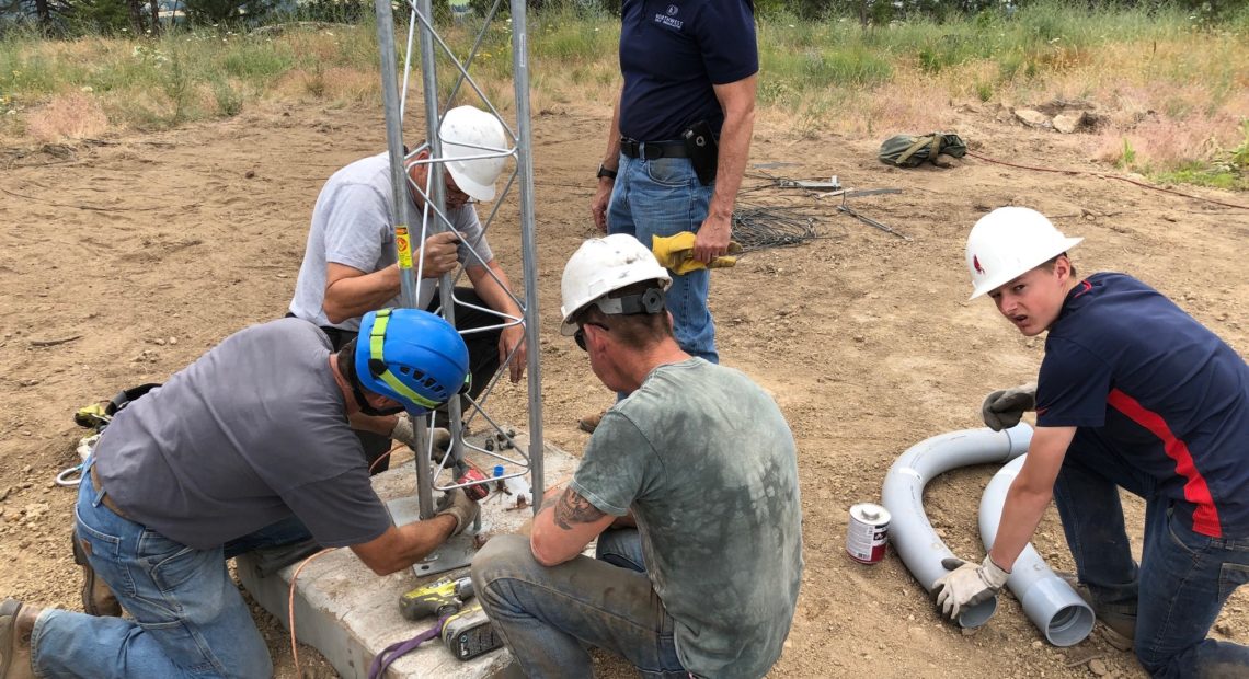 Engineers working on tower