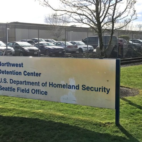 File photo. The Northwest Detention Center, run by the private GEO Group, is located in Tacoma. CREDIT: KOMO via AP