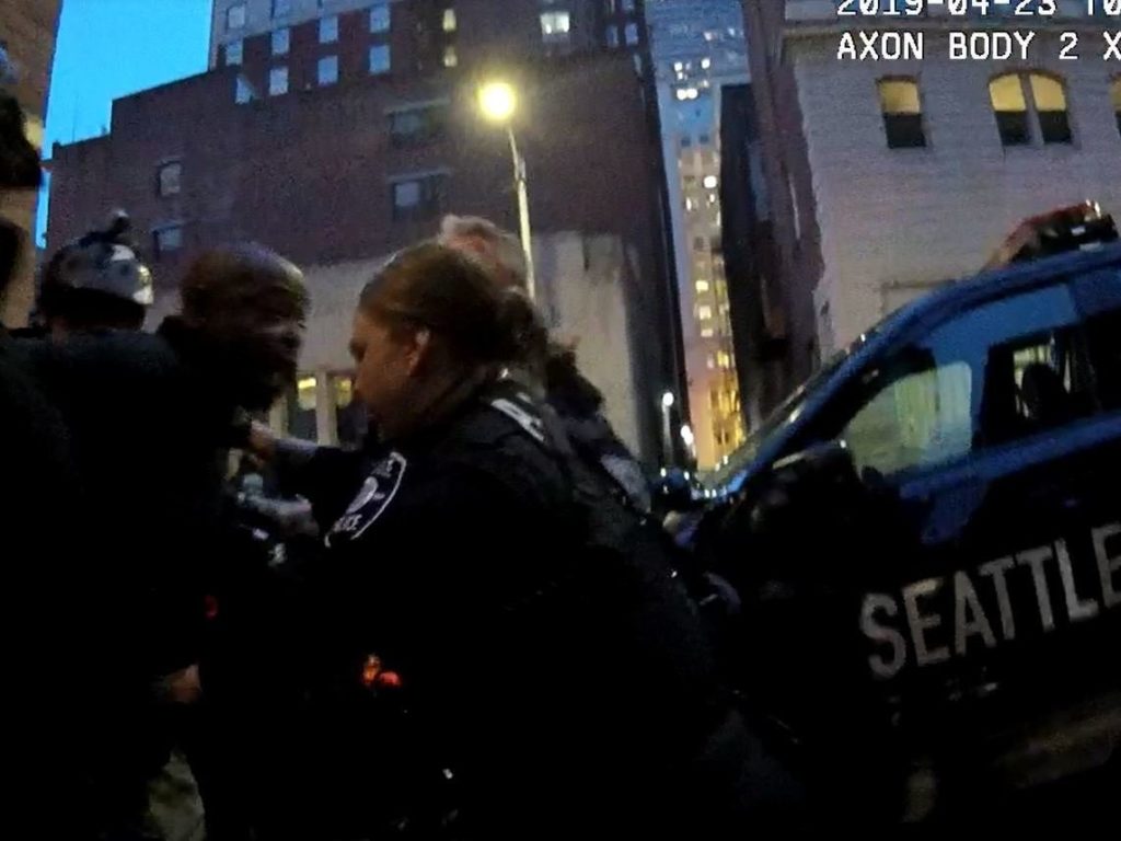 In this incident in April, captured on a police officer's body camera, it took nearly two hours of negotiations and at least a dozen police officers to safely subdue a man with mental illness who had taken over an alleyway. Courtesy of city of Seattle