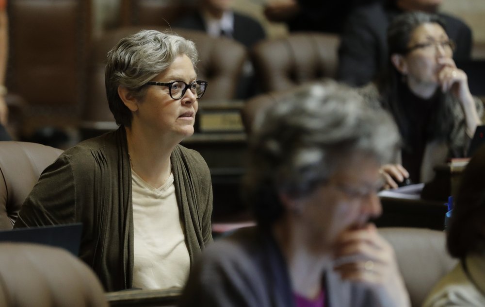 In this April 11, 2019 photo, Rep. Laurie Jinkins, D-Tacoma, listens to debate on the House floor at the Capitol in Olympia. Jinkins became the first woman elected House Speaker in Washington history on July 31, 2019. CREDIT: TED S. WARREN/AP