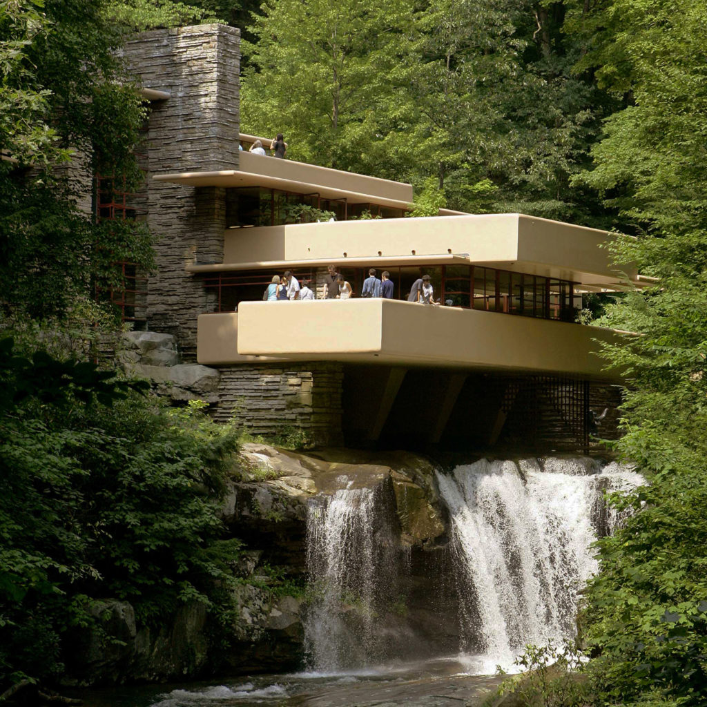 Visitors gather on one of the cantilevered terraces at Fallingwater, a Frank Lloyd Wright design in Pennsylvania. Eight Wright buildings, including Fallingwater, were honored as World Heritage sites by UNESCO, on July 7, 2019. Keith Srakocic/AP