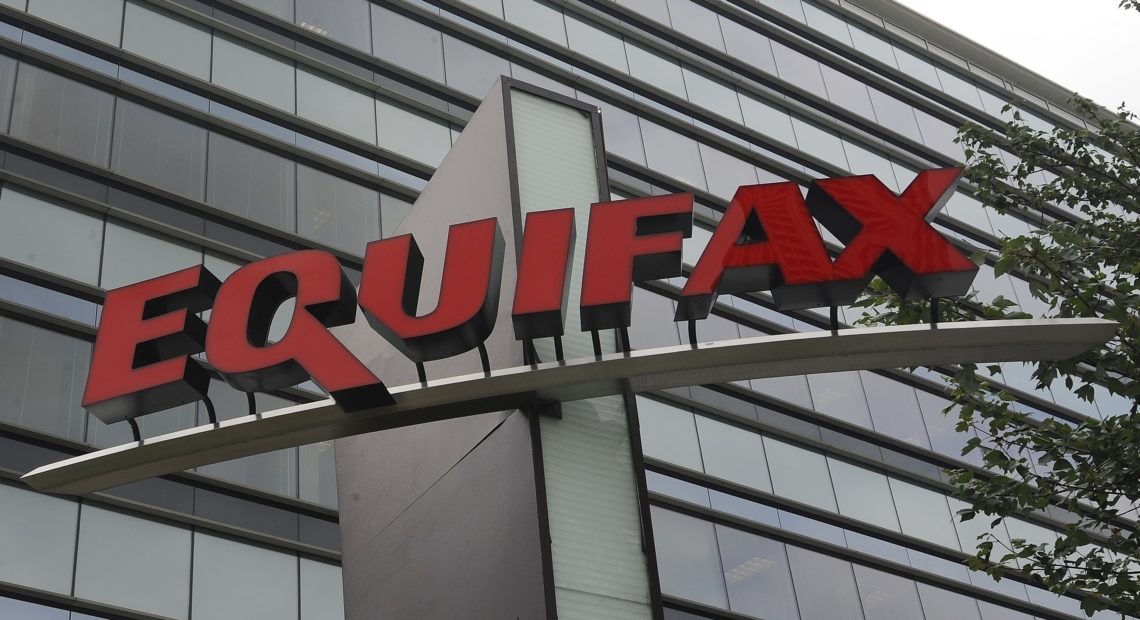 Equifax will pay up to $700 million in a proposed settlement over its 2017 data breach. CREDIT:: Mike Stewart/AP