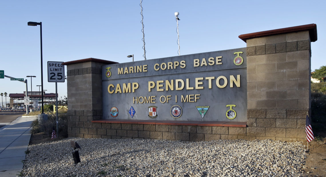 A human smuggling investigation by the military led to the arrest of 16 Marines on Thursday while carrying out a battalion formation at California's Camp Pendleton, a base about an hour's drive from the U.S.-Mexico border. Lenny Ignelzi/AP