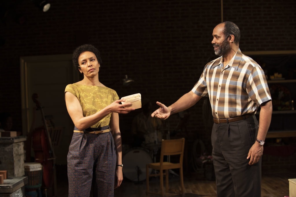 Eisa Davis, pictured here across from Nathaniel Stampley, plays one of the beekeeper sisters. Ahron R. Foster/Courtesy of The Secret Life of Bees