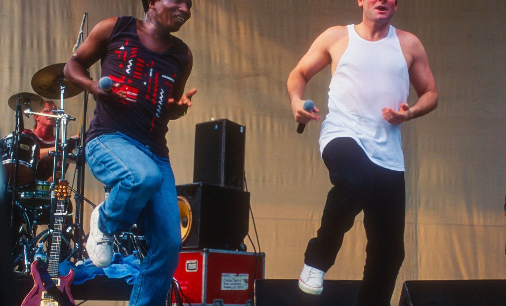 South African musician Johnny Clegg, right, with his longtime bandmate Sipho Mchunu, performing in New York City in 1996. Clegg died Tuesday at age 66. Jack Vartoogian/Getty Images