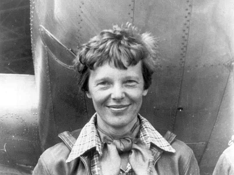File photo of Amelia Earhart beneath the nose of her Lockheed Model 10 Electra in Oakland, California, in March 1937. CREDIT: NATIONAL PORTRAIT GALLERY / SMITHSONIAN INSTITUTION