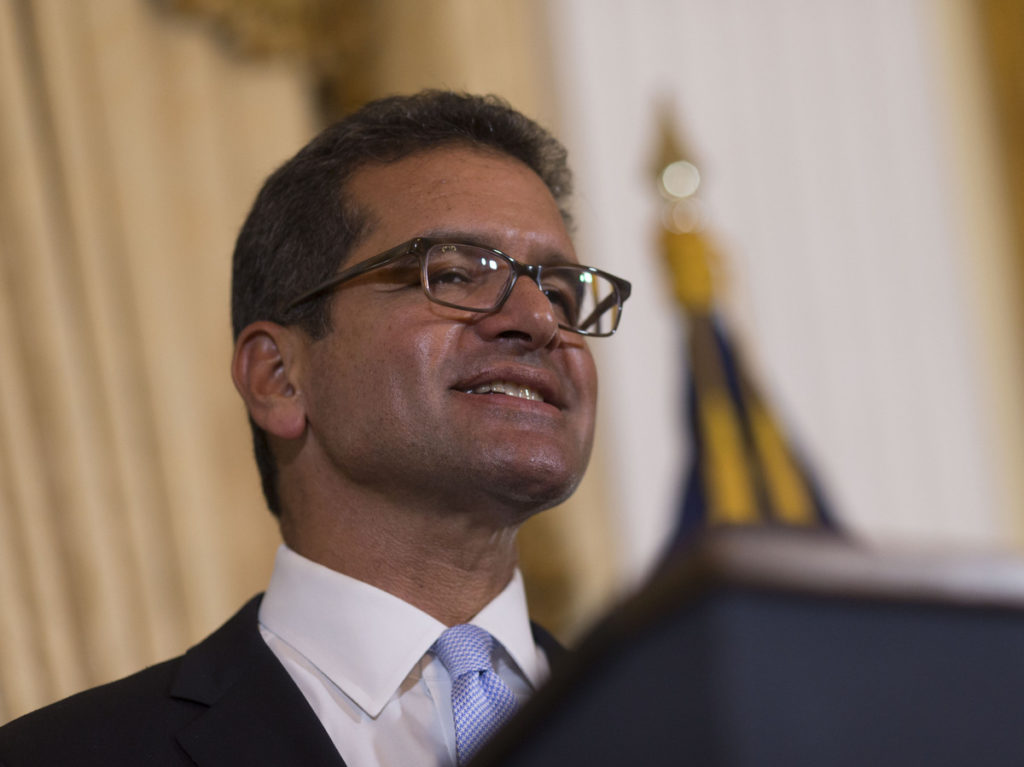 Pedro Pierluisi, sworn in as Puerto Rico's new governor, speaks during a press conference, in San Juan, Puerto Rico, on Friday. CREDIT: Dennis M. Rivera Pichardo/AP