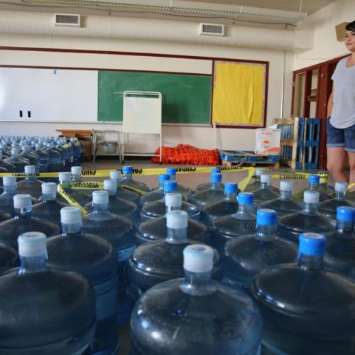 Volunteer Emergency Manager Dorothea Thurby of Warm Springs takes inventory of bottled water Aug. 2, 2019. CREDIT: Emily Cureton/OPB