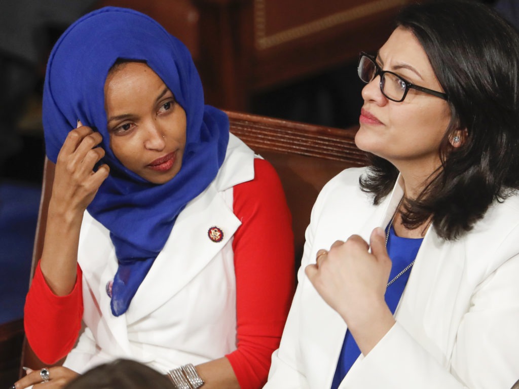 Rep. Ilhan Omar, D-Minn. (left), and Rep. Rashida Tlaib, D-Mich., have been barred from visiting Israel and Palestinian territories by government officials. J. Scott Applewhite/AP