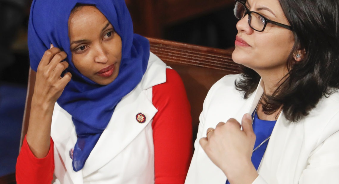 Rep. Ilhan Omar, D-Minn. (left), and Rep. Rashida Tlaib, D-Mich., have been barred from visiting Israel and Palestinian territories by government officials. J. Scott Applewhite/AP