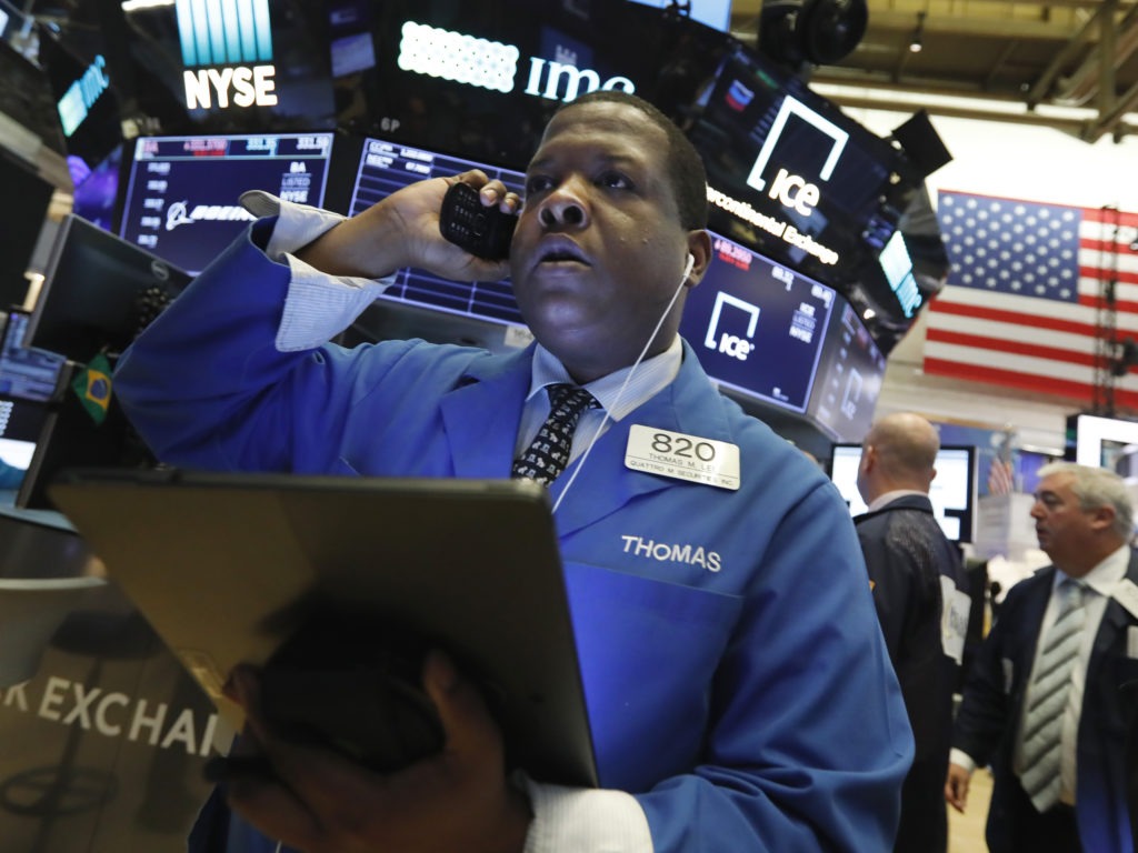 U.S. stocks nosedived Monday as China's currency fell sharply and raised fears that the U.S.-China trade war would keep escalating. CREDIT: Richard Drew/AP
