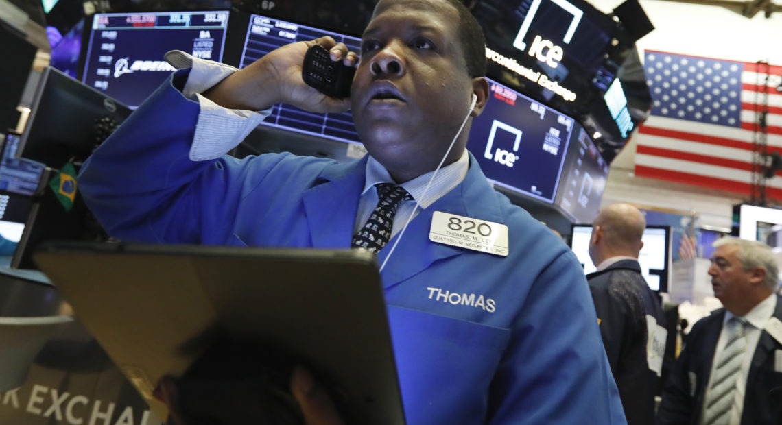 U.S. stocks nosedived Monday as China's currency fell sharply and raised fears that the U.S.-China trade war would keep escalating. CREDIT: Richard Drew/AP