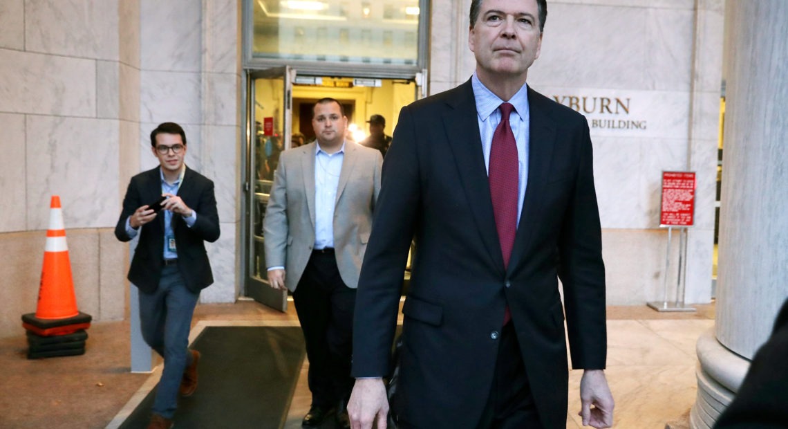 Former FBI Director James Comey leaves the Rayburn House Office Building after testifying to the House judiciary and oversight committees on Capitol Hill on Dec. 7, 2018. Chip Somodevilla/Getty Images