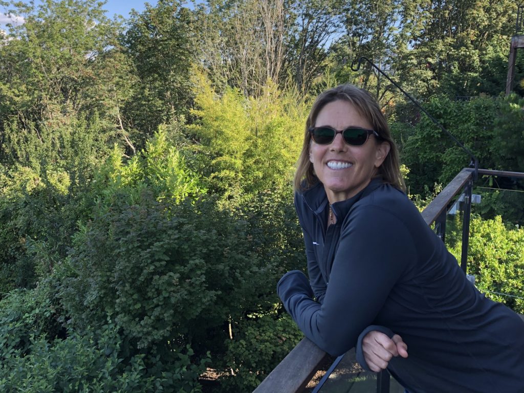 Ginny Gilder at her home in Seattle. Gilder, who won a silver medal in rowing at the 1984 Olympics, owns the Seattle Storm with two other women. Tom Goldman/NPR