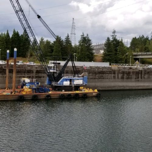 This Sunday, Sept. 8, 2019 photo provided by the U.S. Army Corps of Engineers shows a boat lock on the Bonneville Dam on the Columbia River that connects Oregon and Washington at Cascade Locks., Ore. A critical lock has shut down for repairs, meaning barges that shuttle millions of tons of wheat, wood and other inland goods to the Pacific Ocean for transport to Asia can't move. CREDIT: U.S. Army Corps of Engineers/Twitter