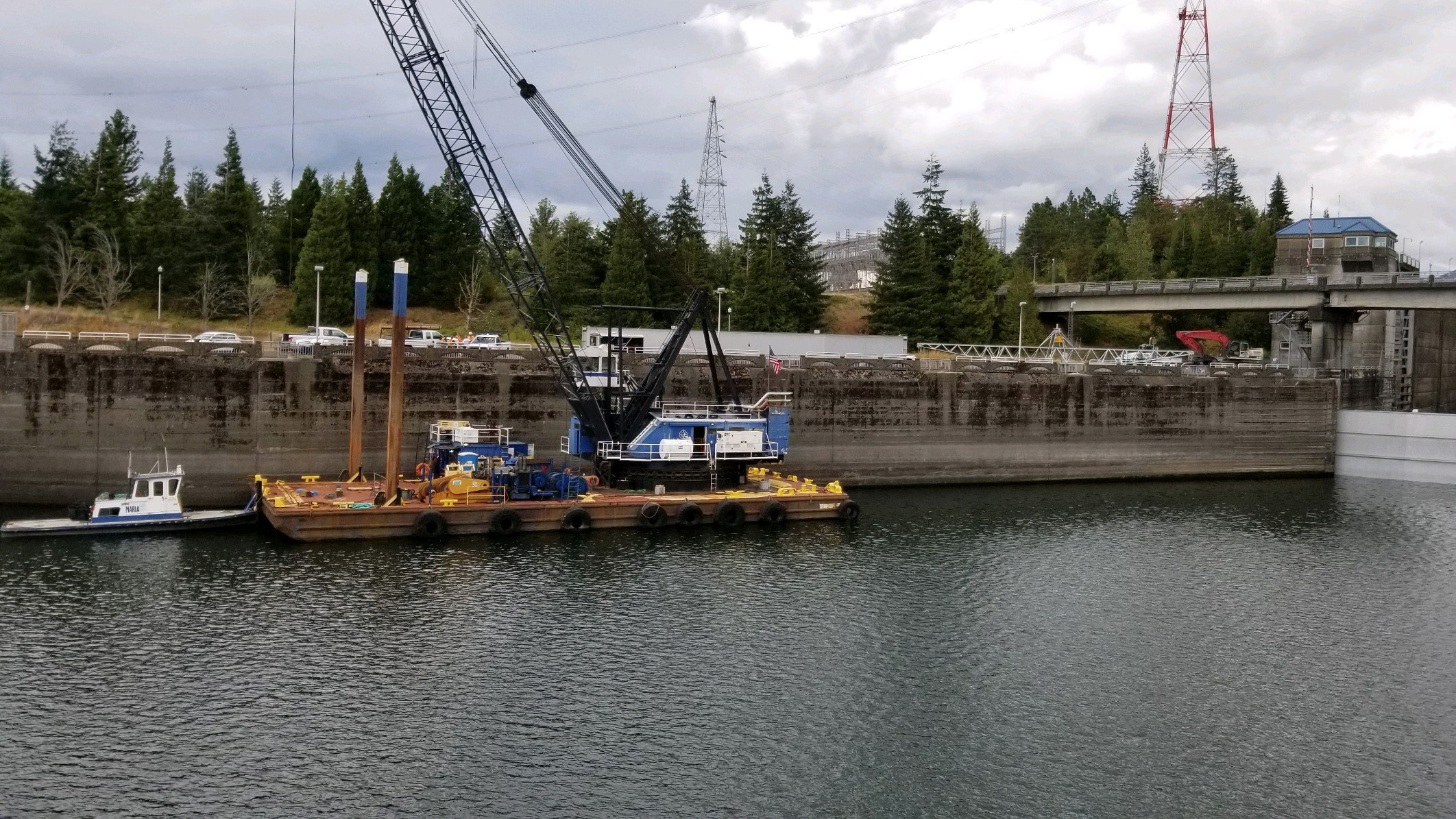 This Sunday, Sept. 8, 2019 photo provided by the U.S. Army Corps of Engineers shows a boat lock on the Bonneville Dam on the Columbia River that connects Oregon and Washington at Cascade Locks., Ore. A critical lock has shut down for repairs, meaning barges that shuttle millions of tons of wheat, wood and other inland goods to the Pacific Ocean for transport to Asia can't move. CREDIT: U.S. Army Corps of Engineers/Twitter