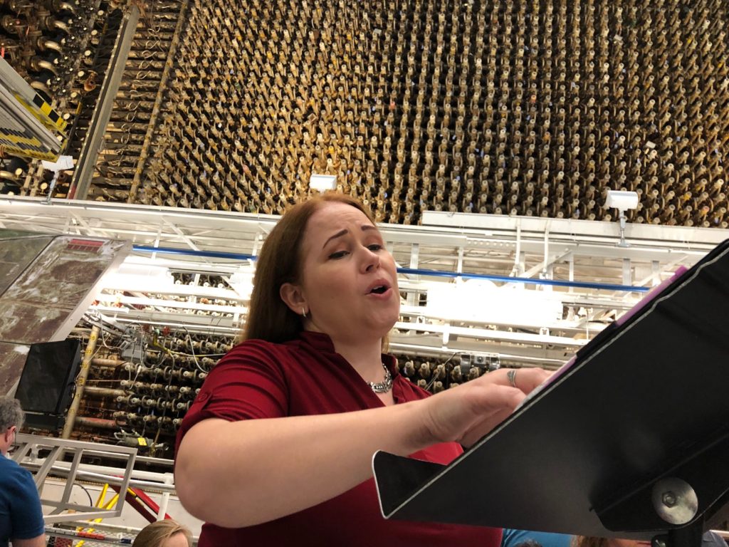 The female soloist, Sarah Mattox, of Edmonds, Wash., sings in the B Reactor at Hanford. CREDIT: ANNA KING/N3