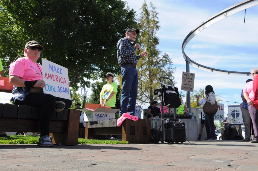 Miles G. McPhee, from Naches, Wash., is a scientist who specializes in Arctic ice. He addressed the crowd gathered in Yakima’s Millenium Plaza Friday, Sept. 20. For those who study climate he says “there’s this moment when you realize this is really serious. This is going to affect our kids and their kids. The world is changing and it’s changing rapidly.” CREDIT: Enrique Pérez de la Rosa/NWPB