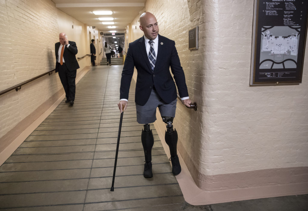 Rep. Brian Mast, R-Fla., and other members of Congress are appealing a decision by the Department of Veterans Affairs to evict them from office spaces at VA hospitals. J. Scott Applewhite/AP