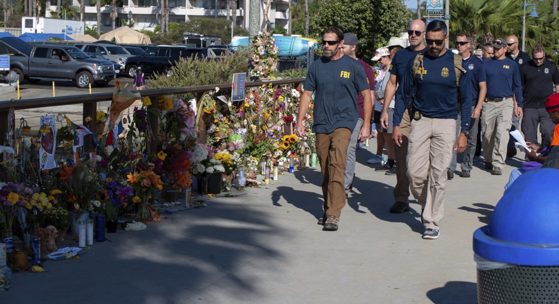 Investigators are looking at "all ignition sources" as they search for what sparked a boat fire in California that killed 34 people. CREDIT: Christian Monterrosa/AP