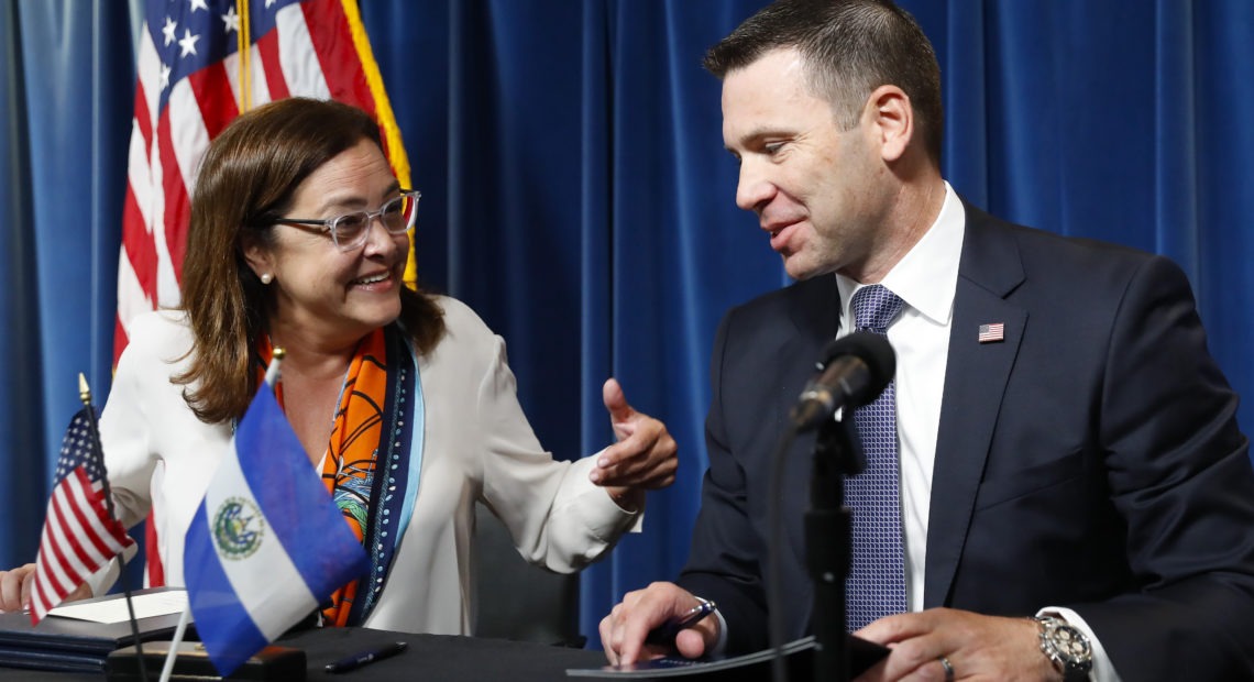 Acting Secretary of Homeland Security Kevin K. McAleenan, right, with Alexandra Hill Tinoco, left, minister of Foreign Affairs for El Salvador, after signing an asylum agreement in Washington, D.C. Pablo Martinez Monsivais/AP