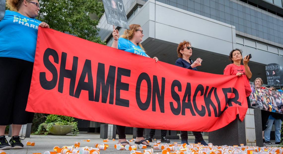 Members of P.A.I.N. (Prescription Addiction Intervention Now) and Truth Pharm staged a protest on Thursday outside Purdue Pharma headquarters in Stamford, Conn., over its recent controversial opioid settlement. CREDIT: Erik McGregor/LightRocket via Getty Images