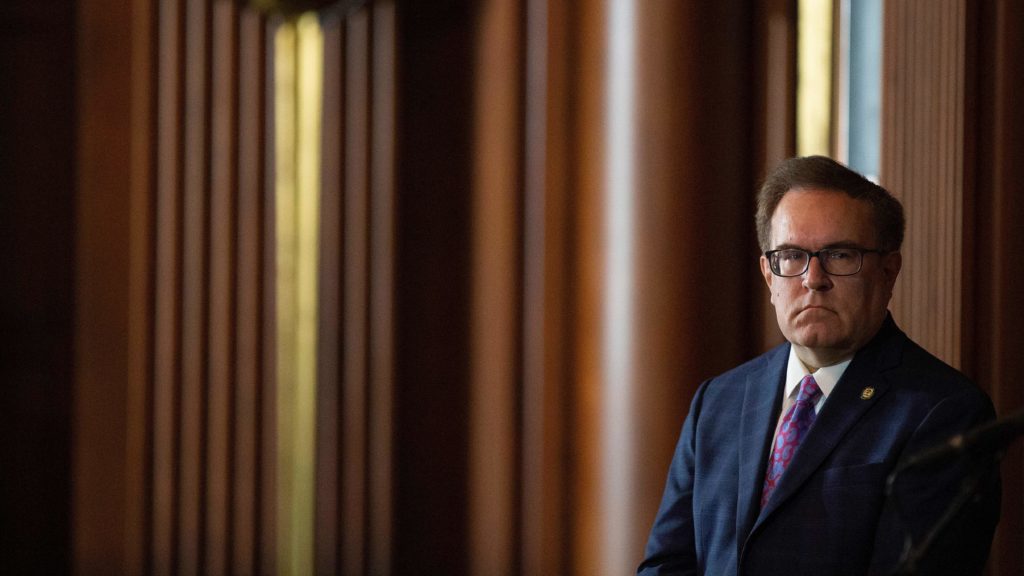 Andrew Wheeler, administrator of the Environmental Protection Agency looks on during a news conference Thursday at the agency's headquarters in Washington, D.C. CREDIT: Alastair Pike/AFP/Getty Images