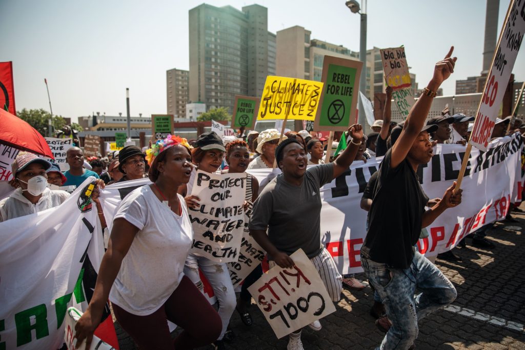 Protesters march during a Fridays for Future rally against climate change in Johannesburg, South Africa. CREDIT: Michele Spatari/AFP/Getty Images
