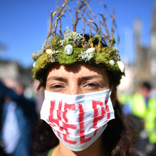 The Global Climate Strike drew scores of protesters around the world Friday, as young people answered a call from activist Greta Thunberg to demand action on climate change. Here, a protester attends a rally in Edinburgh, Scotland. CREDIT: Jeff J Mitchell/Getty Images
