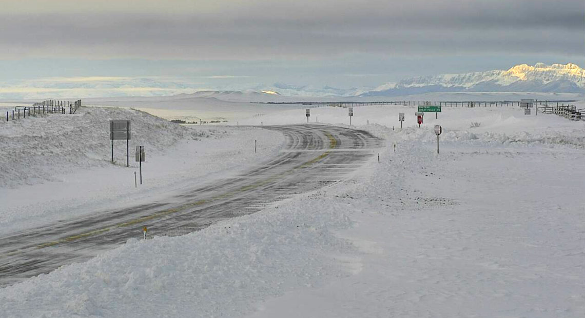 A highway webcam shows a snowy portion of U.S. Highway 89 near Pendroy, Mont., on Monday morning after a record-setting winter storm dumped snow on the northern Rockies. Montana Department of Transportation