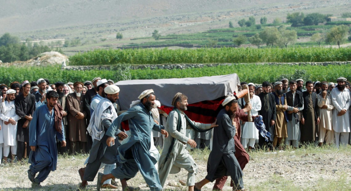 Men carry a coffin of one of the victims after a drone strike, in Khogyani district of Nangarhar province, Afghanistan September 19, 2019. CREDIT: Parwiz/Reuters