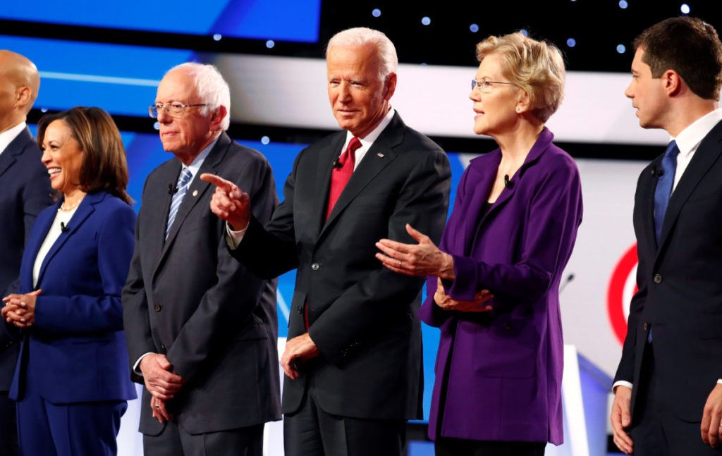 Senator Kamala Harris, Senator Bernie Sanders, former Vice President Joe Biden, Senator Elizabeth Warren and South Bend Mayor Pete Buttigieg wait onstage before the fourth Democratic U.S. 2020 presidential election debate at Otterbein University in Westerville, Ohio October 15, 2019. Photo by Aaron Josefcz/Reuters