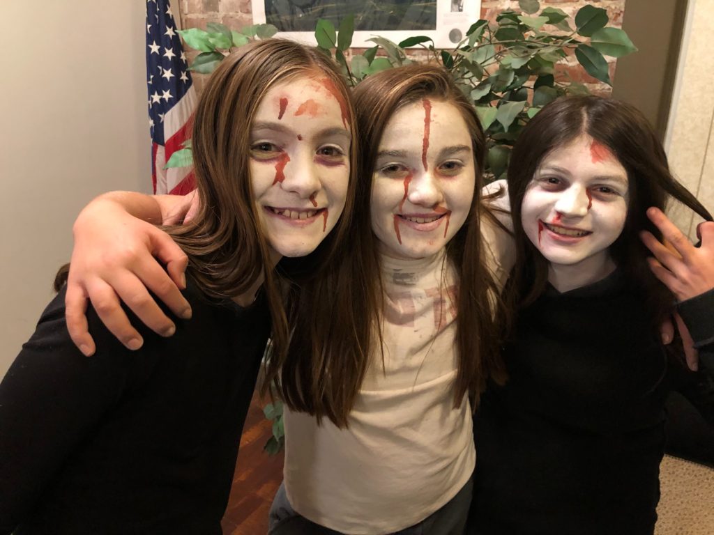 From left, Elena Flansburg, Morgan Lentz, Saralynn De La Cruz, enjoy scaring patrons of Haunted Palouse. CREDIT: Anna King/N3