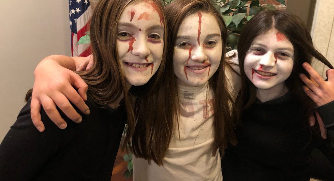 From left, Elena Flansburg, Morgan Lentz, Saralynn De La Cruz, enjoy scaring patrons of Haunted Palouse. CREDIT: Anna King/N3