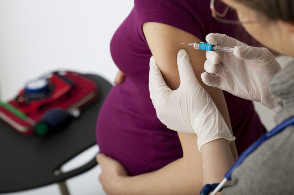 Though complications from the flu can be deadly for people who are especially vulnerable, including pregnant women and their newborns, typically only about half of pregnant women get the needed vaccination, U.S. statistics show. CREDIT: BSIP/Getty Images