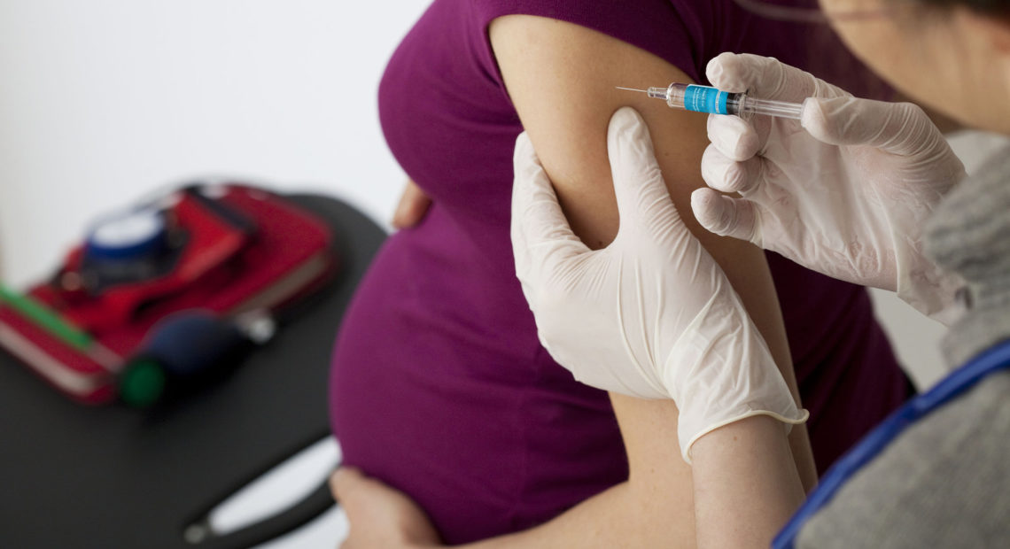 Though complications from the flu can be deadly for people who are especially vulnerable, including pregnant women and their newborns, typically only about half of pregnant women get the needed vaccination, U.S. statistics show. CREDIT: BSIP/Getty Images