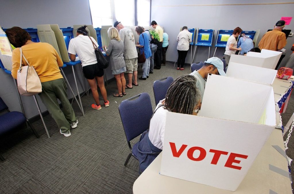 People cast their ballots for the 2016 general elections at a crowded polling station as early voting begins in North Carolina, in Carrboro, North Carolina, in 2016. CREDIT: Jonathan Frank/Reuters