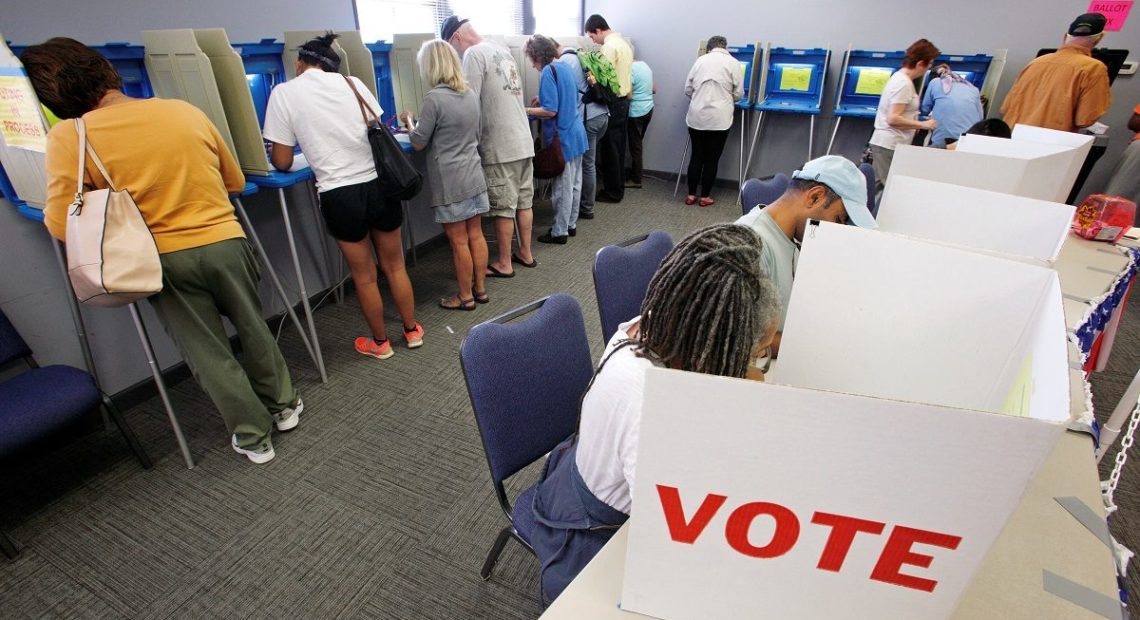 People cast their ballots for the 2016 general elections at a crowded polling station as early voting begins in North Carolina, in Carrboro, North Carolina, in 2016. CREDIT: Jonathan Frank/Reuters