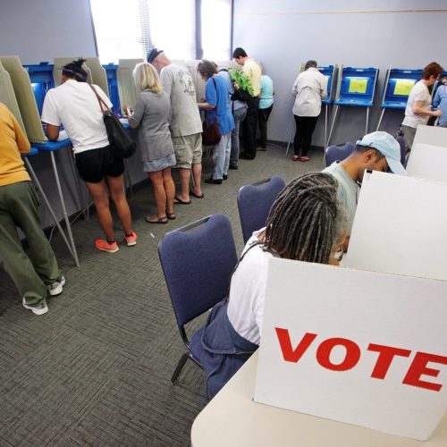 People cast their ballots for the 2016 general elections at a crowded polling station as early voting begins in North Carolina, in Carrboro, North Carolina, in 2016. CREDIT: Jonathan Frank/Reuters