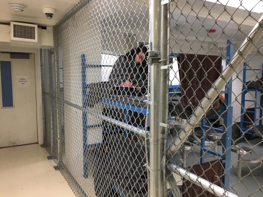 Women inmates at the Mason County Jail in Shelton, Washington are held behind chain link fencing and given extra blankets to ward off the cold. One inmate said the nickname for the unit is the 