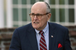 Associates of President Trump's personal lawyer Rudy Giuliani, pictured in May 2018, have been arrested on campaign finance charges. CREDIT: Carolyn Kaster/AP