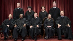 The Supreme Court justices, pictured in November 2018, start a new term on Monday. CREDIT: J. Scott Applewhite/AP