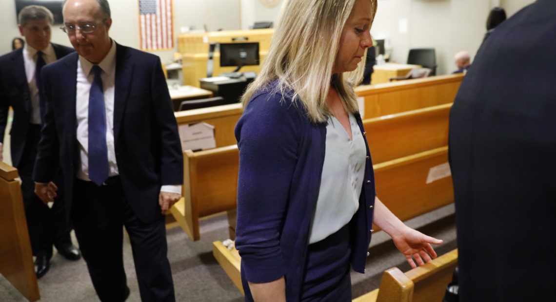 Fired Dallas police Officer Amber Guyger leaves the courtroom after a jury found her guilty of murder Tuesday. Guyger shot and killed Botham Jean, an unarmed 26-year-old neighbor, in his own apartment last year. She told police she thought his apartment was her own and that he was an intruder. CREDIT: Tom Fox/The Dallas Morning News via AP