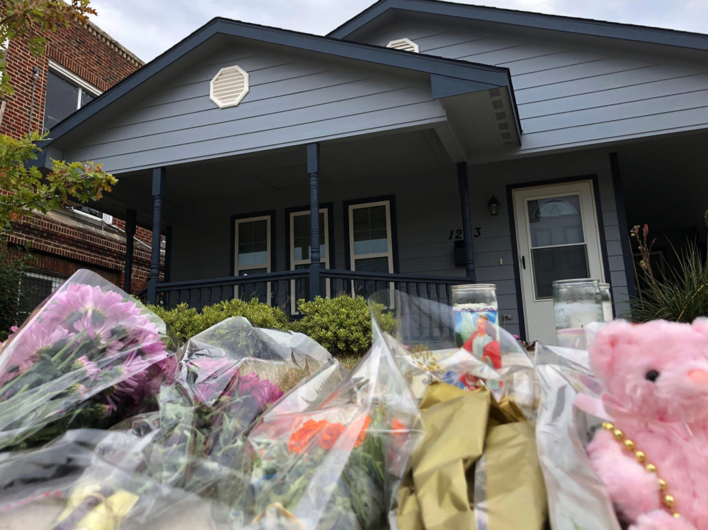 Bouquets of flowers and stuffed animals are piling up outside the Fort Worth, Texas, home of 28-year-old Atatiana Jefferson, who was shot to death early Saturday morning by a police officer. CREDIT: Jake Bleiberg/AP